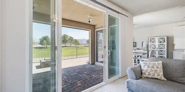 Image 2: An open concept living area seamlessly flows into