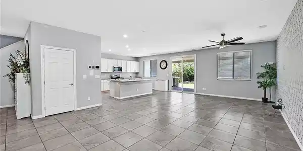 Image 4: A spacious, naturally illuminated room featuring a