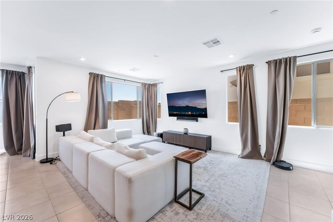 Image 3: A well-lit gathering space offers relaxation, with