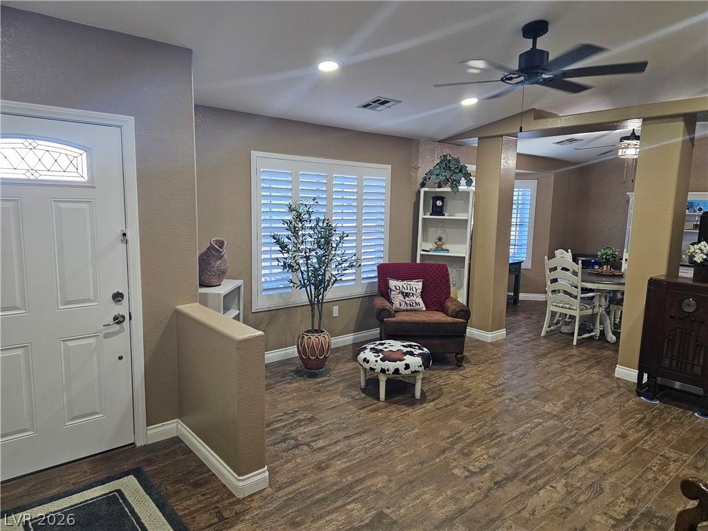 Image 4: A welcoming entryway flows into a generously propo
