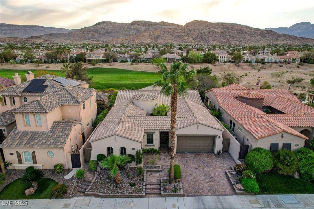 Image 1: Bird's eye view with a residential view and a moun
