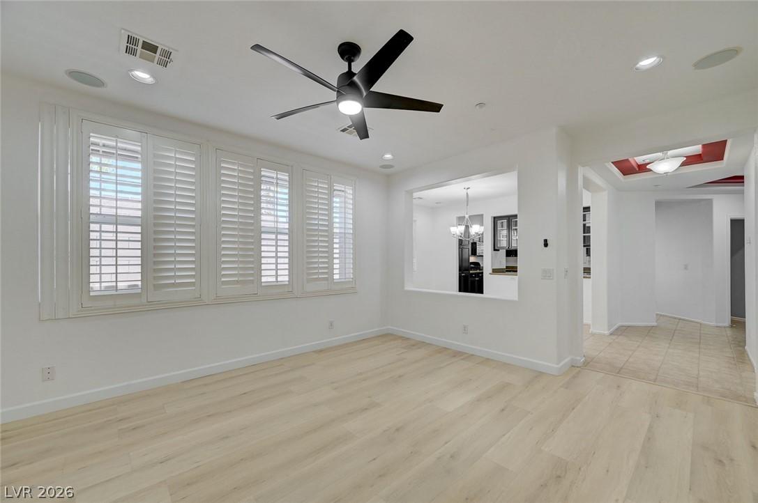 Image 4: A well-lit interior space features sleek flooring,