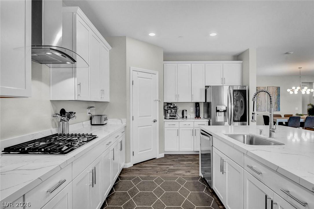 Image 4: This modern Kitchen boasts lots of white cabinetry