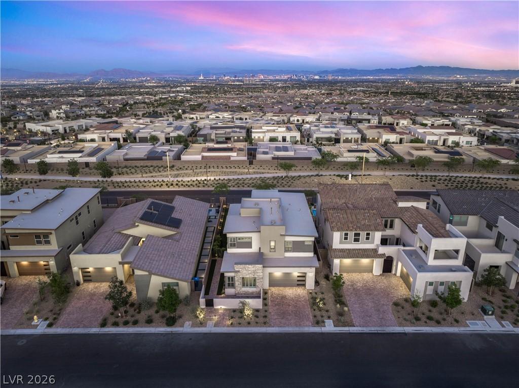 Image 3: An aerial perspective reveals a vibrant neighborho