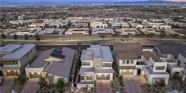 Image 3: An aerial perspective reveals a vibrant neighborho