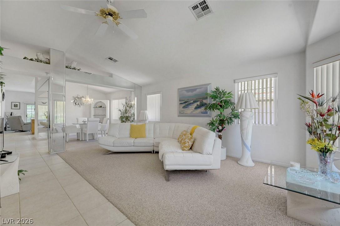 Image 4: Vast, bright living space with vaulted ceilings cr