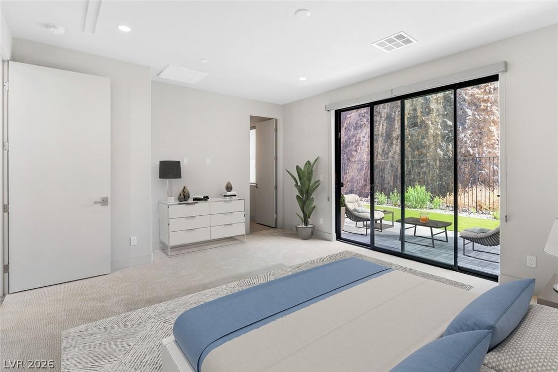 Image 4: Sliding glass doors open to a private patio, exten