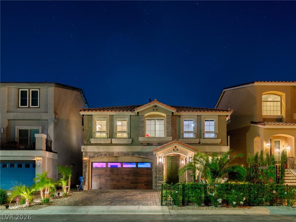 Image 2: An inviting facade glows under a star-dusted night