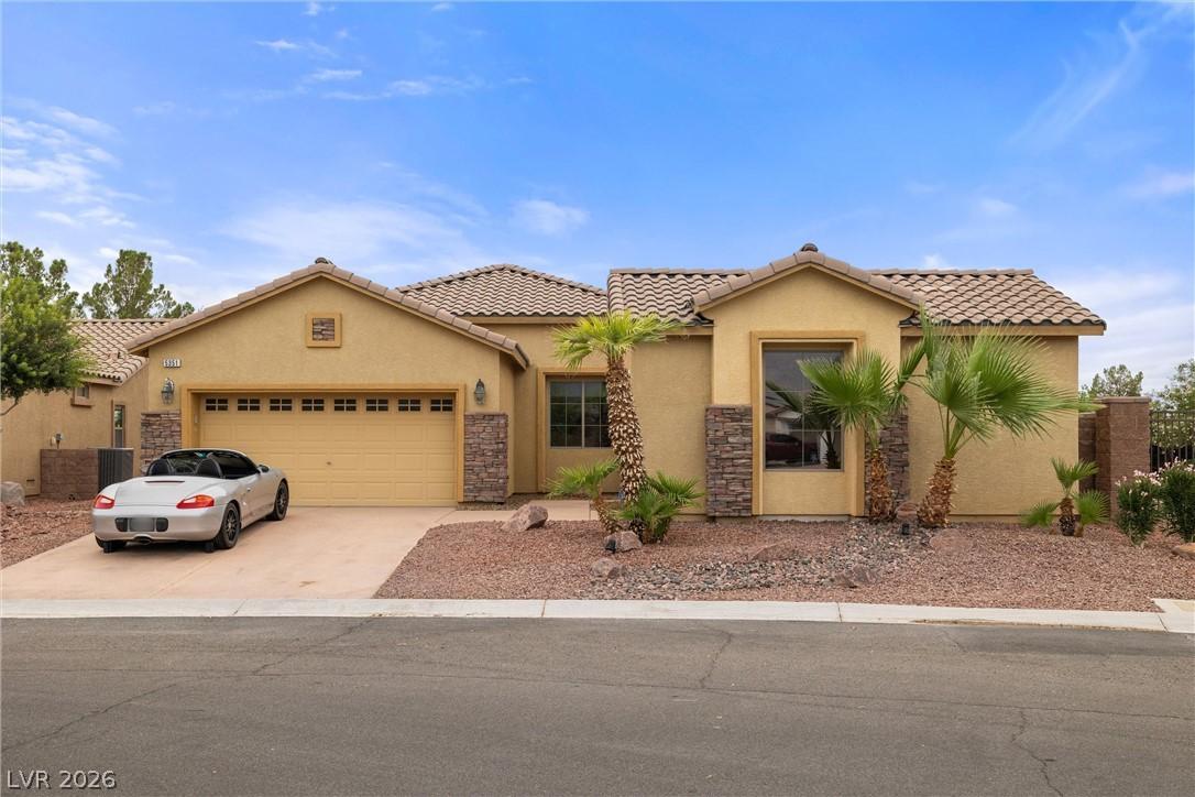 Image 1: This desert oasis features a classic tiled roof an
