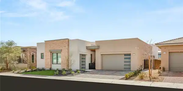 Image 2: Clean lines and stone accents define this modern s