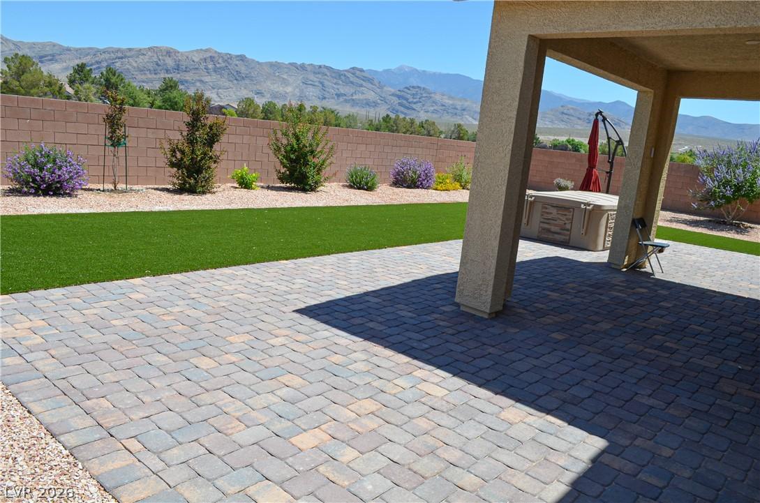 Image 4: Breathtaking Mountain Views!  An inviting paver pa