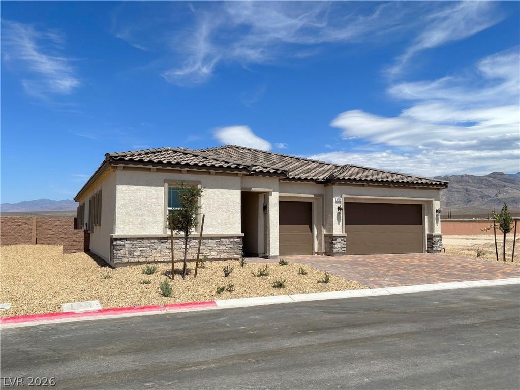 Image 2: View of front of house featuring a mountain view,