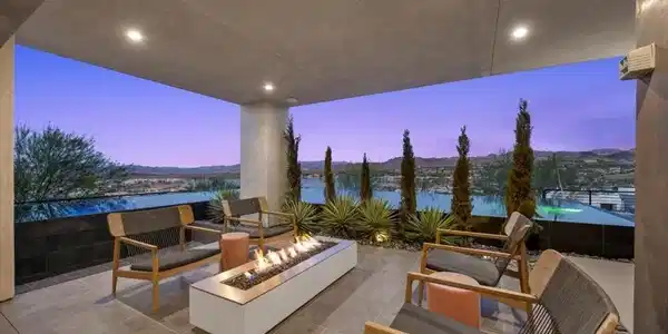 Image 3: An inviting outdoor patio features a cozy fire pit