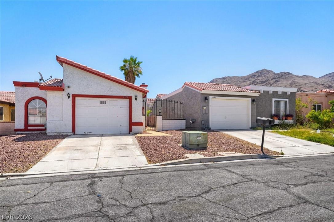 Image 4: An inviting desert home with a mountain vista beyo