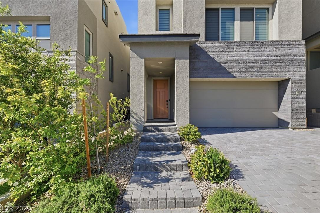 Image 2: Direct front walk up with paver walkway leading to