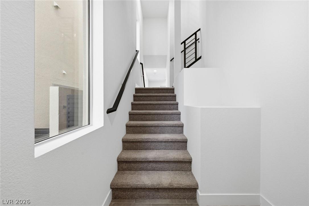 Image 4: Walk up the stairs from the entry level to the bri