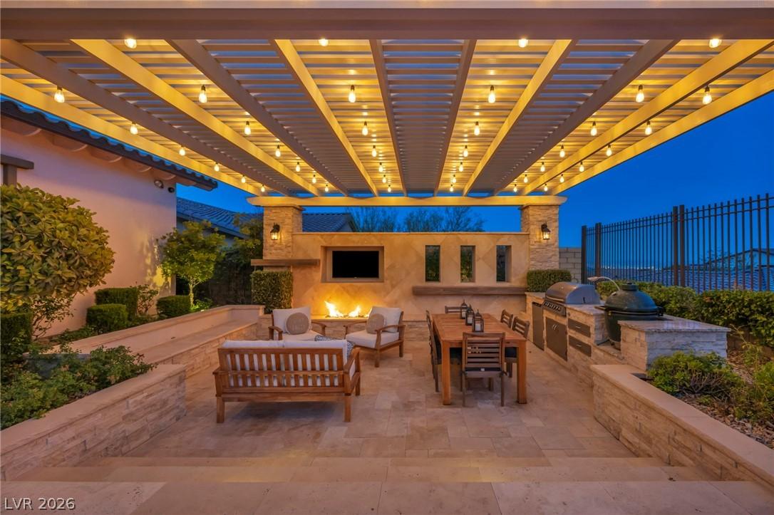 Image 3: An inviting outdoor living space features an impre