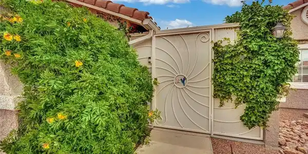 Image 3: Doorway to property with a privacy gate