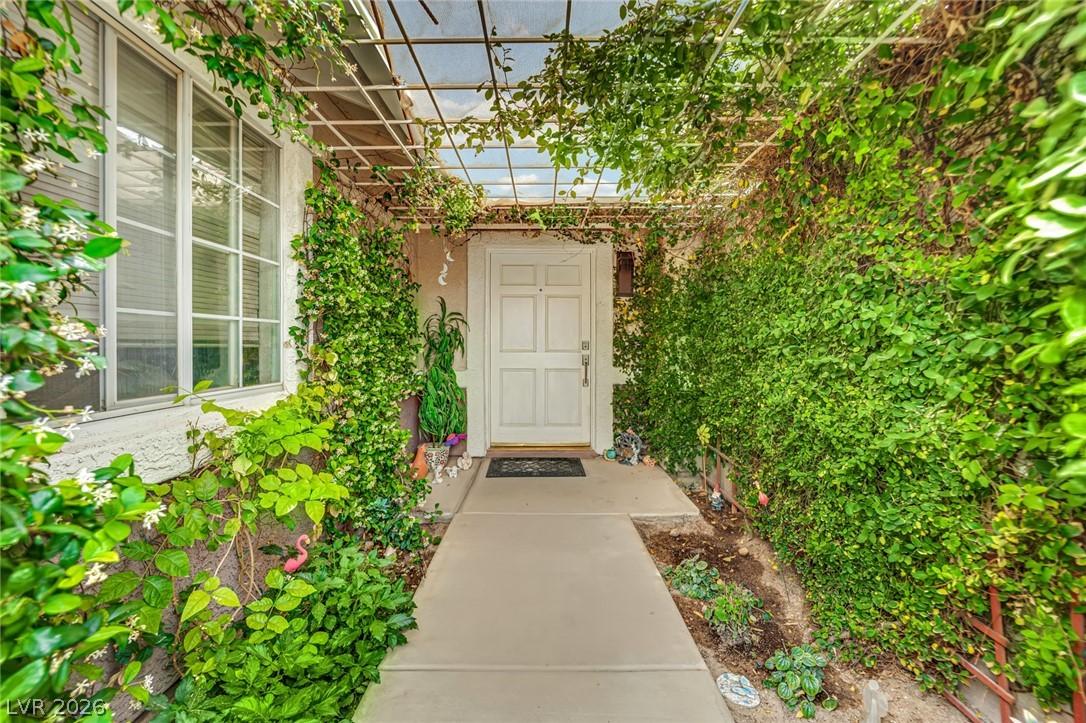 Image 4: Doorway to property past privacy gate