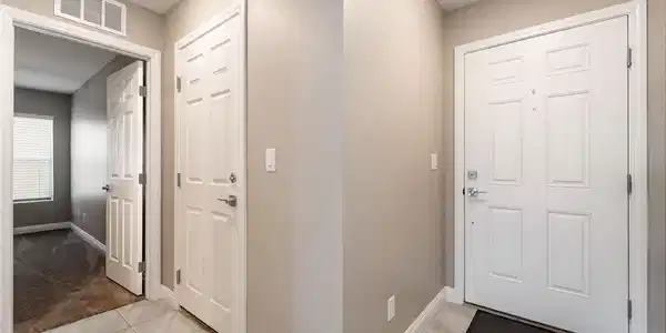 Image 4: A welcoming entryway with tile flooring leads into