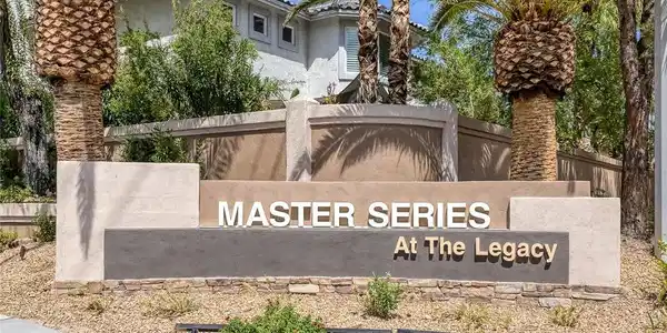 Image 2: Towering palm trees frame the monument sign welcom