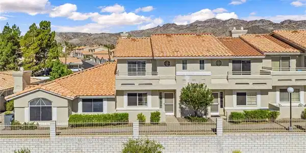 Image 2: Terracotta-tiled roofs grace this multi-level home