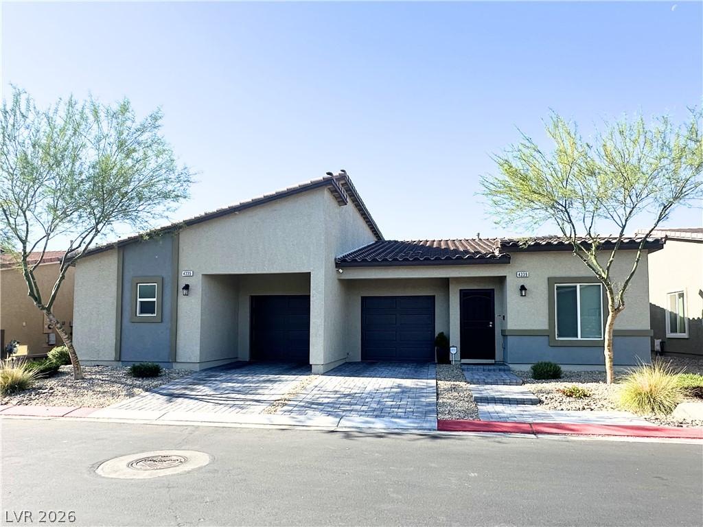 Image 3: HOA maintained front landscaping on this charming