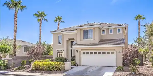 Image 3: Palm trees frame a modern multi-level exterior fea