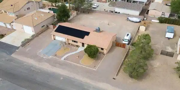 Image 4: Solar panels line the roof of this property featur