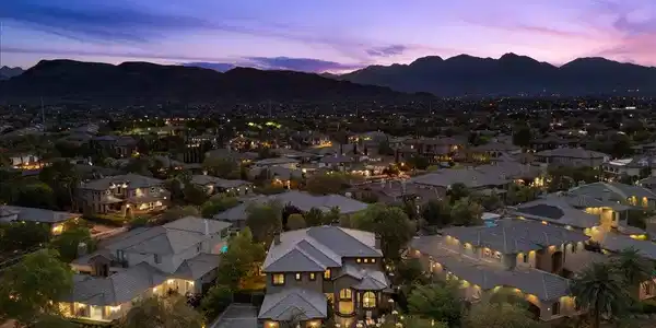 Image 2: Aerial view of the neighborhood with mountain vist