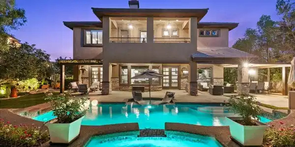Image 3: Inviting pool and spa perfect for relaxation and e