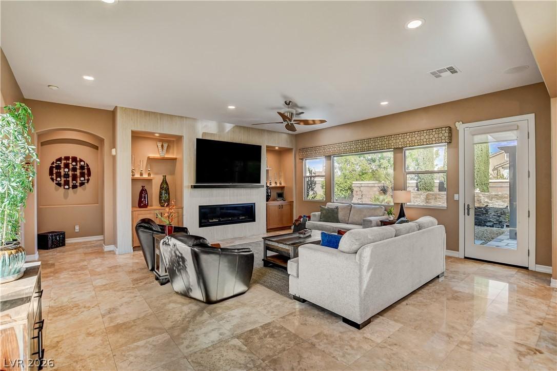 Image 4: Well-appointed living area boasts an integrated fi