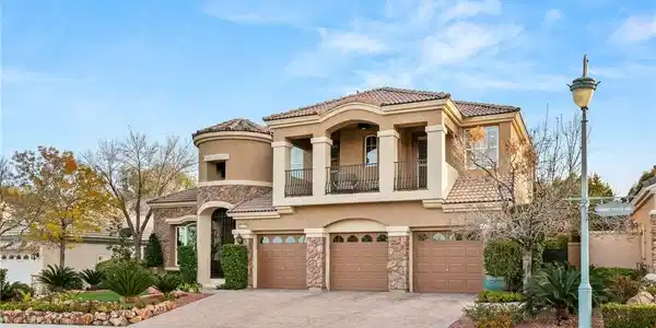Image 4: Elegant Mediterranean exterior features stone acce