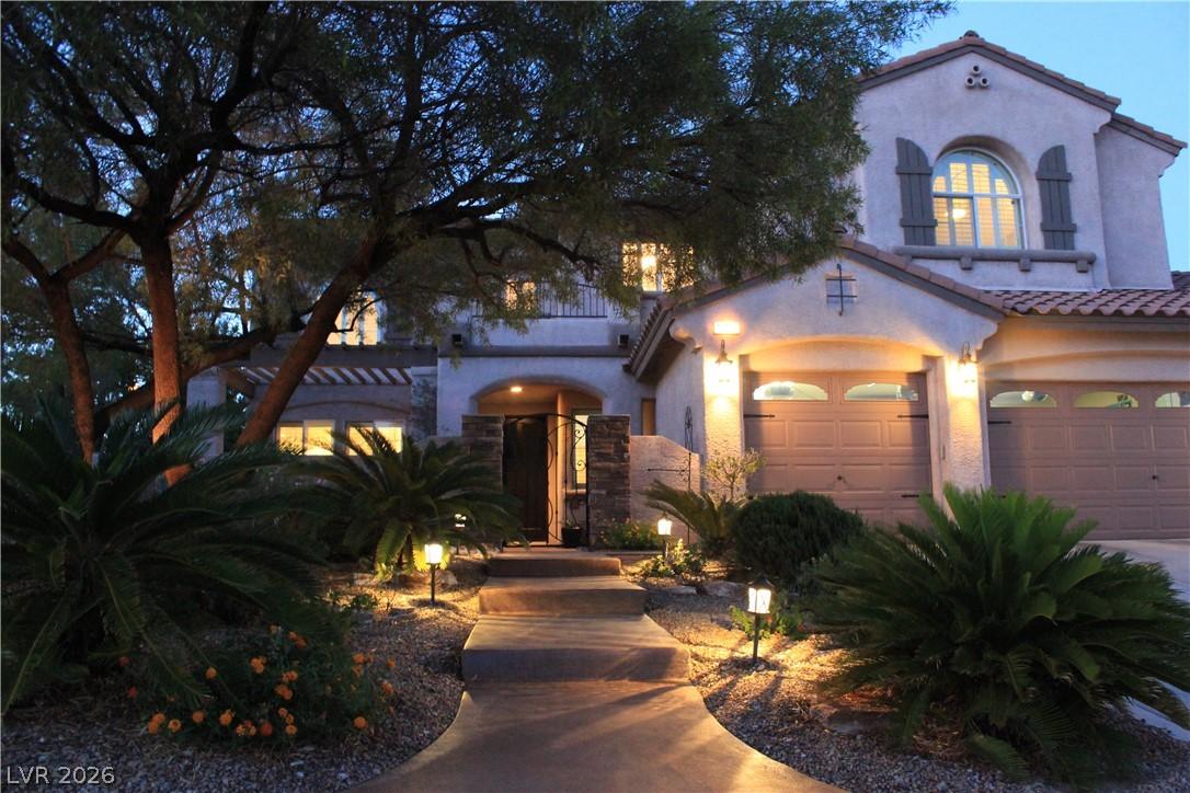 Image 4: Path lighting guides you to the welcoming entry of
