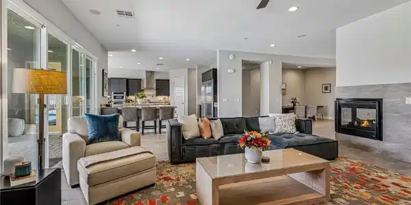 Image 2: A refined living space showcasing a grand piano an