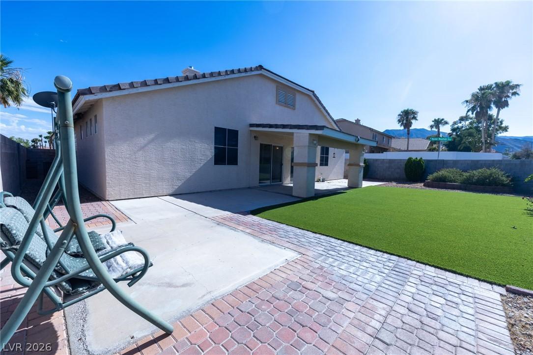Image 2: Enjoy outdoor living with a spacious patio, brick