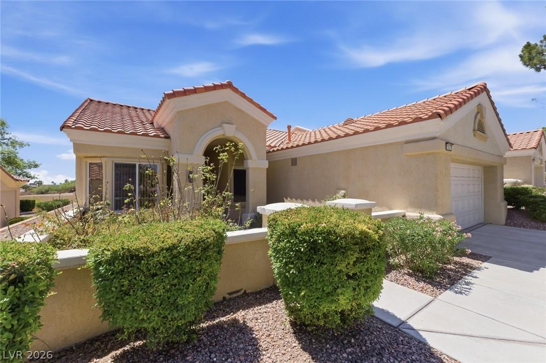 Image 3: This desert-adapted home features classic tile roo