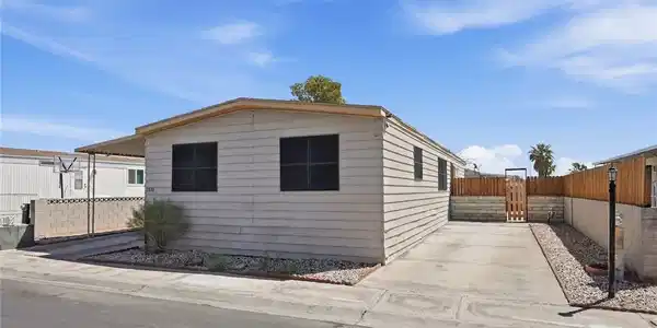 Image 2: Clean lines and low-maintenance siding define this