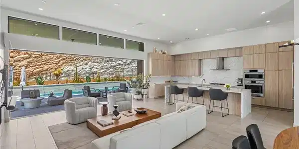 Image 3: An open-concept living space with a gourmet kitche