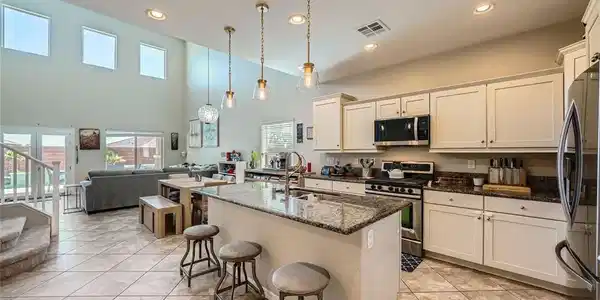Image 3: Kitchen with appliances with stainless steel finis