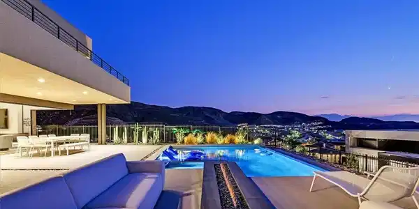 Image 3: View of pool with a mountain view, a patio, an out