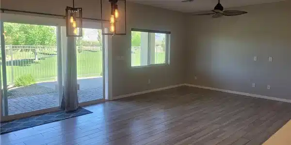 Image 3: Step into a sun-filled living space with ample roo