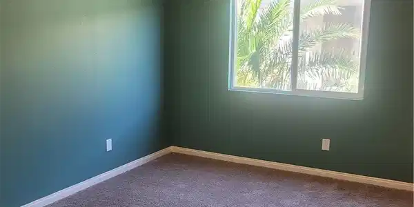 Image 4: An inviting secondary bedroom offers soft carpetin