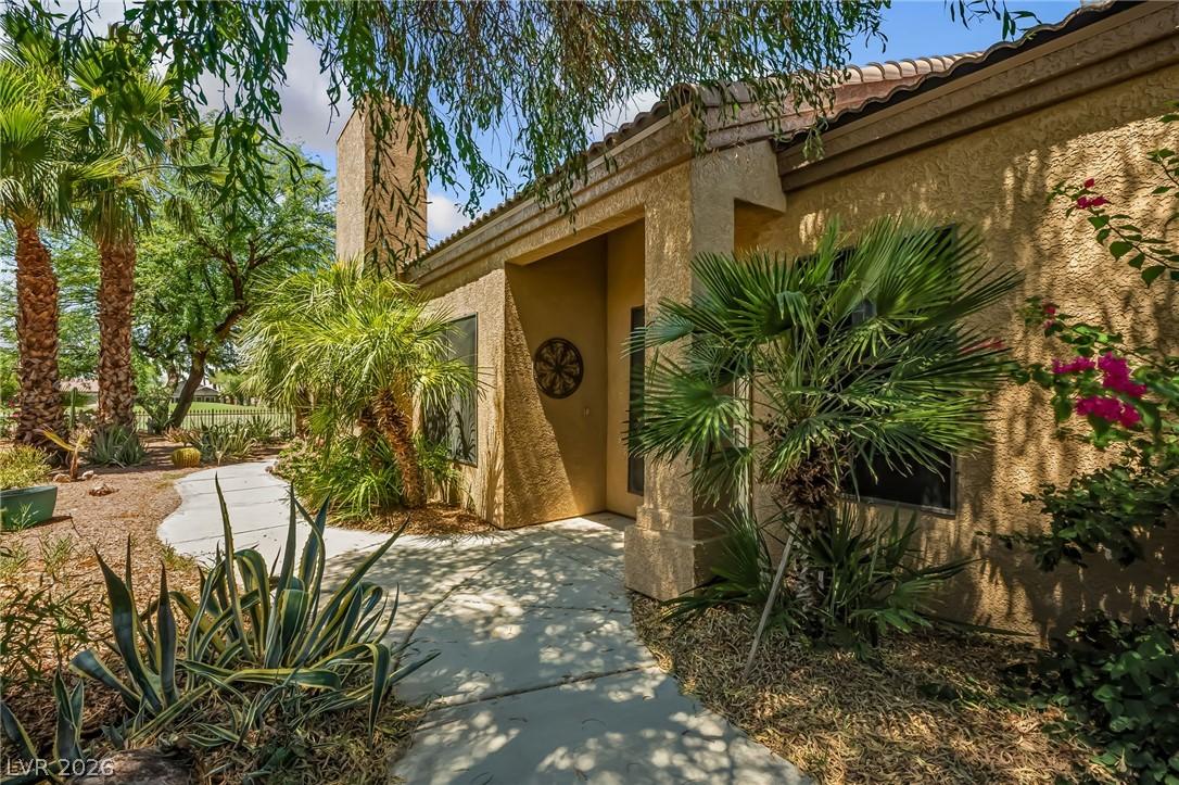 Image 4: A graceful pathway winds through desert landscapin