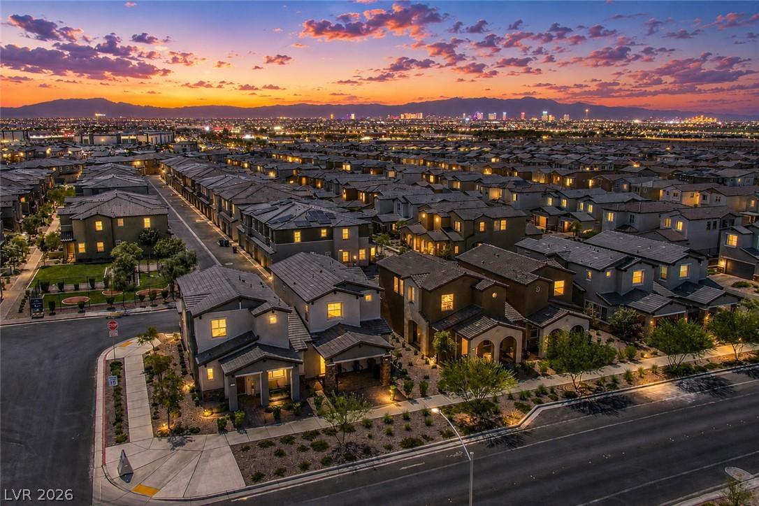 Image 2: An aerial perspective reveals a vibrant neighborho