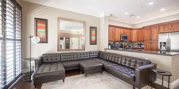 Image 3: Living room with crown molding, recessed lighting,