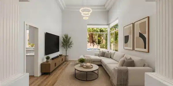 Image 3: Tall ceilings and abundant natural light create an