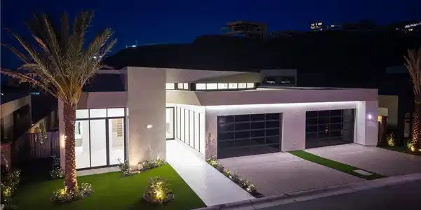 Image 3: Modern architecture with sleek lines and illuminat