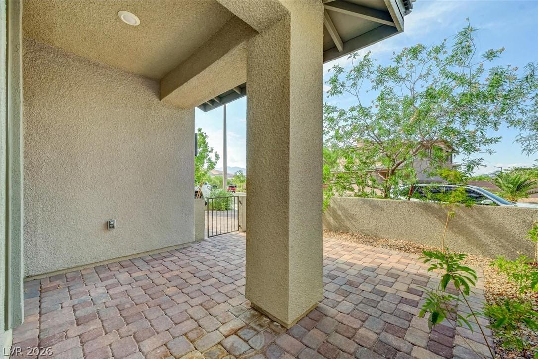 Image 3: A welcoming paver patio provides a charming outdoo