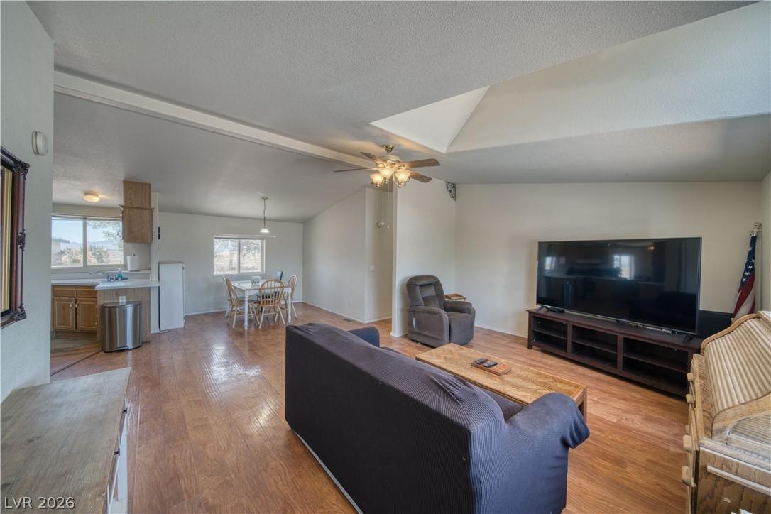 Image 4: An open floorplan seamlessly connects the living a